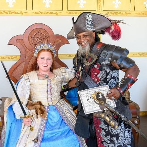 Braider-and-guy_500 Queen Elizabeth on her throne with a pirate standing next to her